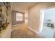 Upstairs hallway with carpet and built-in bookcases at 1849 Indian Bend Dr, Henderson, NV 89074