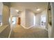 Upstairs hallway with carpeted floors and built-in shelves at 1849 Indian Bend Dr, Henderson, NV 89074
