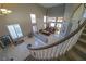 Two-story living room with marble floors and fireplace at 1849 Indian Bend Dr, Henderson, NV 89074