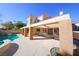 Inviting pool area with pergola, spacious patio, and lush landscaping at 1849 Indian Bend Dr, Henderson, NV 89074