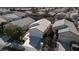 Aerial view of three houses with driveways, landscaping, and a mailbox at 2185 Indigo Creek Ave, Henderson, NV 89012