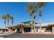 Community clubhouse with palm trees at 2185 Indigo Creek Ave, Henderson, NV 89012