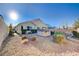 Spacious backyard with hot tub and gravel landscaping at 2452 Blair Castle St, Henderson, NV 89044