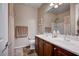 Well-lit bathroom with double sinks and shower/tub combo at 2452 Blair Castle St, Henderson, NV 89044
