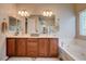 Bathroom boasts double sinks, a soaking tub, and ample counter space at 2452 Blair Castle St, Henderson, NV 89044