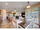 Kitchen and dining area with table and chairs, open to Gathering room at 2452 Blair Castle St, Henderson, NV 89044