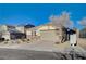 Single-story home with attached garage and desert landscaping at 2452 Blair Castle St, Henderson, NV 89044