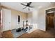 Well-equipped home gym featuring weights, a punching bag, and a weight bench at 2452 Blair Castle St, Henderson, NV 89044