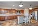 Kitchen with granite countertops, island, and stainless steel appliances at 2452 Blair Castle St, Henderson, NV 89044