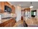 Kitchen with granite countertops, stainless steel appliances, and tile backsplash at 2452 Blair Castle St, Henderson, NV 89044