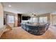 Spacious living room with sectional sofa and built-in shelving at 2452 Blair Castle St, Henderson, NV 89044