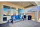 Relaxing covered patio with comfortable seating and a grill at 2452 Blair Castle St, Henderson, NV 89044