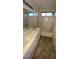 Clean bathroom featuring a double sink vanity and combination tub and shower at 2536 Grand Basin Dr, Las Vegas, NV 89156