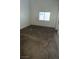 Clean and simple bedroom featuring a window for natural light and ample space for furniture arrangement at 2536 Grand Basin Dr, Las Vegas, NV 89156