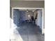 Spacious garage interior with room for storage, showcasing potential for organization and vehicle parking at 6216 Pangea Ave, Las Vegas, NV 89139