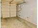 A clean garage with an automatic door, providing a safe and convenient space for parking and storage at 6216 Pangea Ave, Las Vegas, NV 89139