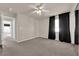 Bright bedroom with neutral walls, carpet flooring and ceiling fan at 6360 Stag Hollow Ct, Las Vegas, NV 89139