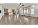 Open floor plan with kitchen, living room, and access to backyard at 6360 Stag Hollow Ct, Las Vegas, NV 89139