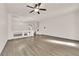 Open living area with hardwood floors, high ceilings, and chandelier at 6360 Stag Hollow Ct, Las Vegas, NV 89139