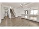 Open living room with hardwood floors, high ceilings, and a chandelier at 6360 Stag Hollow Ct, Las Vegas, NV 89139