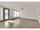 Spacious living room featuring hardwood floors and an elegant entryway at 6360 Stag Hollow Ct, Las Vegas, NV 89139