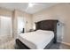 Bright bedroom with ensuite bathroom and plush bed at 6407 Carmel Creek Ave, Las Vegas, NV 89139