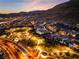 Night view of community nestled in the mountains at 10325 Jade Point Dr, Las Vegas, NV 89135