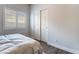 Cozy bedroom with shuttered window and a closet at 2144 Paganini Ave, Henderson, NV 89052