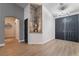 Elegant foyer with wood floors, a stylish light fixture, and modern decor creating a welcoming entrance at 2144 Paganini Ave, Henderson, NV 89052
