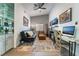 Comfortable living room with a workspace featuring contemporary decor, ample natural light, and a chic aesthetic at 2144 Paganini Ave, Henderson, NV 89052