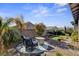 Backyard featuring a seating area and mini-golf at 2395 Dalewood Ave, North Las Vegas, NV 89086