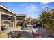 Backyard with a grill, seating area, and landscaping at 2395 Dalewood Ave, North Las Vegas, NV 89086