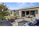 Backyard with patio, fire pit, and mini-golf at 2395 Dalewood Ave, North Las Vegas, NV 89086