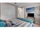 Comfortable bedroom with closet and artwork at 2395 Dalewood Ave, North Las Vegas, NV 89086