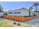 Entrance to Del Webb North Ranch with desert landscaping and a contemporary sign at 2395 Dalewood Ave, North Las Vegas, NV 89086