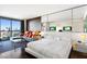 Bright bedroom with a queen-size bed and city views at 4381 W Flamingo Rd # 17318, Las Vegas, NV 89103