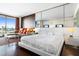 Modern bedroom with a queen bed and large window at 4381 W Flamingo Rd # 17318, Las Vegas, NV 89103