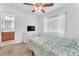 Bedroom with ensuite bathroom and ceiling fan at 7053 Solana Ridge Dr, North Las Vegas, NV 89084