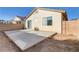 Spacious backyard with a large concrete patio area at 8139 Azure Falls Ct, Las Vegas, NV 89117