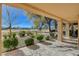 Expansive backyard view overlooking the golf course, mature landscaping, and covered patio at 8805 Litchfield Ave, Las Vegas, NV 89134