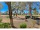 Inviting backyard with lush landscaping and scenic views of the golf course at 8805 Litchfield Ave, Las Vegas, NV 89134