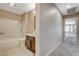 Bathroom features a shower-tub combo and single sink vanity at 8805 Litchfield Ave, Las Vegas, NV 89134