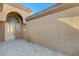 Inviting front entrance with tiled flooring and arched entryway at 8805 Litchfield Ave, Las Vegas, NV 89134