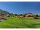 Rolling green golf course with mountain views at 8805 Litchfield Ave, Las Vegas, NV 89134