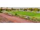 Landscaped walking path alongside the scenic golf course at 8805 Litchfield Ave, Las Vegas, NV 89134