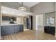 Bright kitchen featuring an island, stainless steel appliances, and plenty of storage space at 8805 Litchfield Ave, Las Vegas, NV 89134