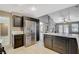 Spacious kitchen offering stainless steel appliances, a large island and view into the living room at 8805 Litchfield Ave, Las Vegas, NV 89134