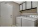 Laundry room features a washer and dryer at 8805 Litchfield Ave, Las Vegas, NV 89134