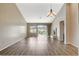 Large living room with wood floors, a fireplace and plenty of natural light at 8805 Litchfield Ave, Las Vegas, NV 89134