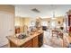 Open kitchen with island, views to living area at 9742 Darlington Ct, Las Vegas, NV 89149